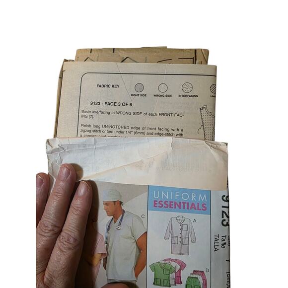 McCall's Sewing Pattern 9123 Scrubs Lab Coat Top Hats Pants Unisex S, M, L Uncut - Picture 3 of 3